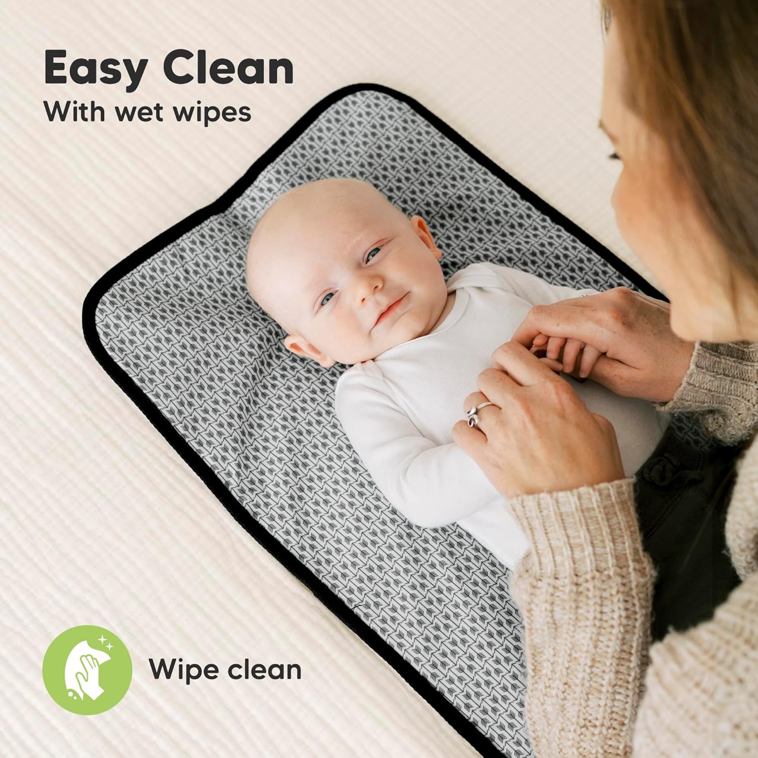 KeaBabies Swift grey travel changing pad with black edges, wipe-clean surface