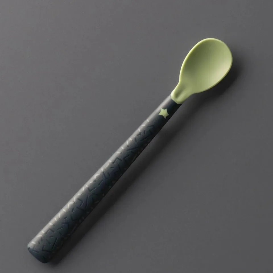 Tommee Tippee Softee weaning spoon with green bowl and black handle, pack of five