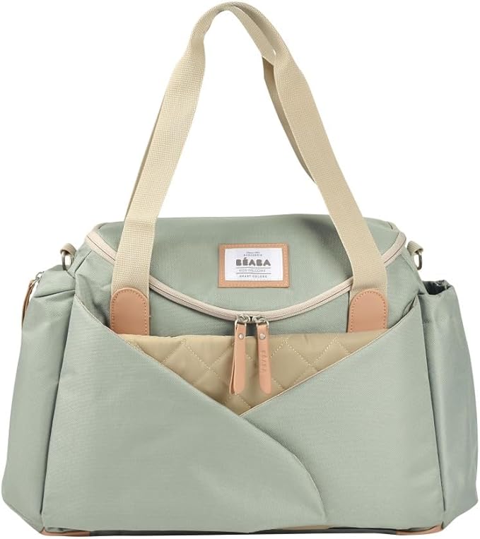 Béaba Sydney II changing bag in leaf green with cream handles and tan trim
