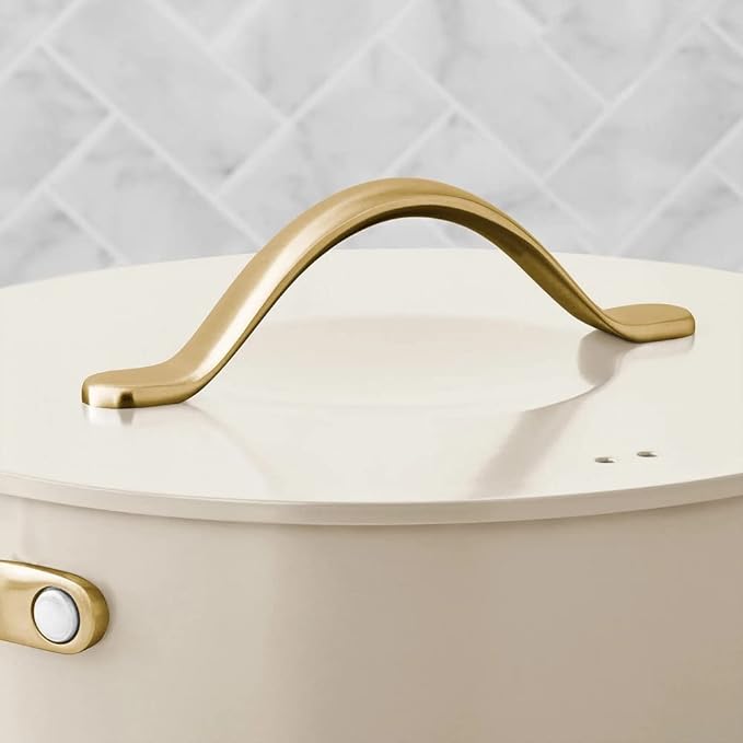 Member's Mark cream ceramic cookware pot with gold handle and lid