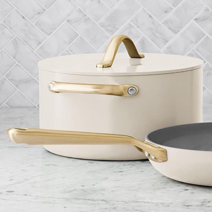 Member's Mark 11-piece cream ceramic cookware set with gold handles