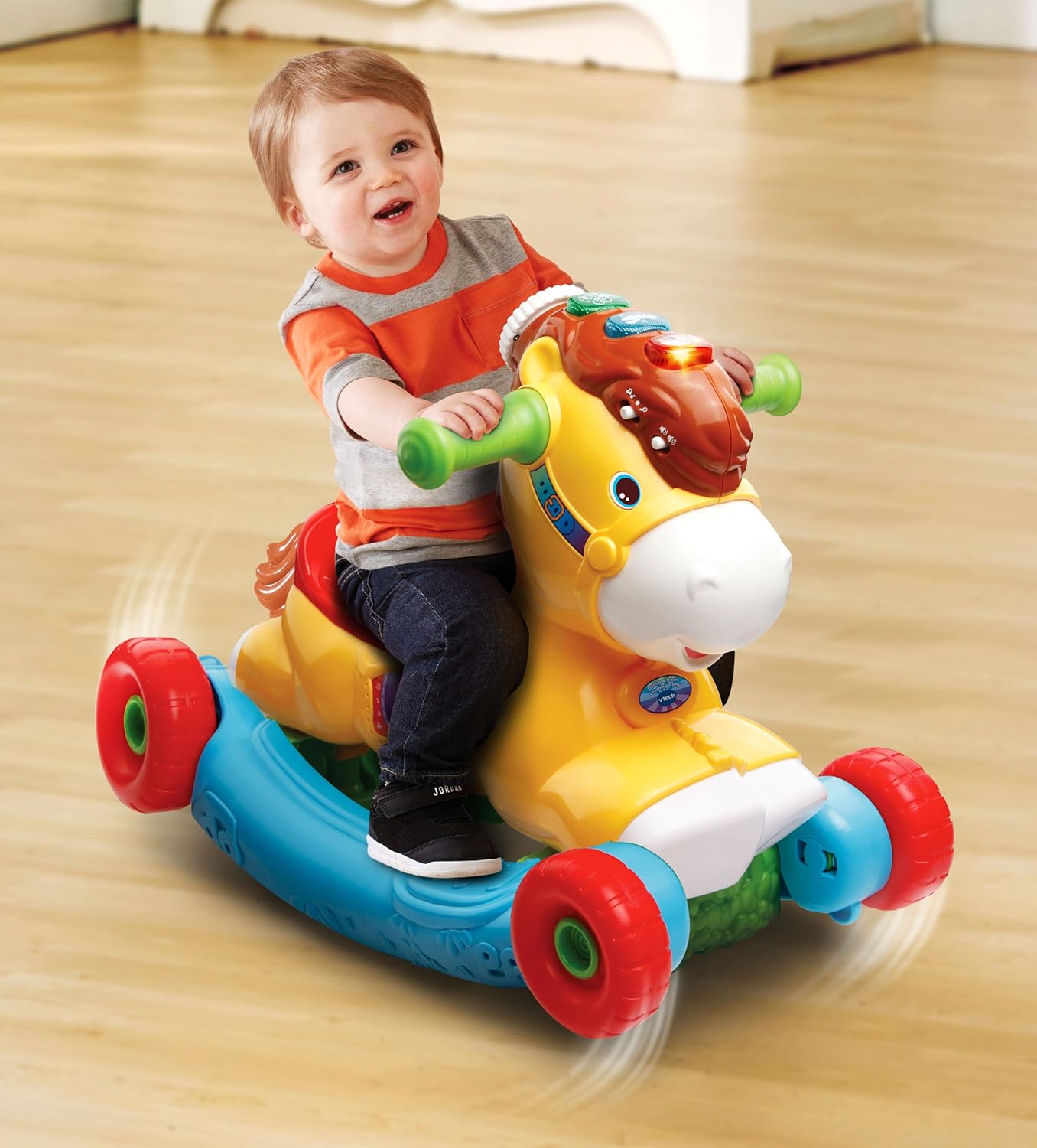 VTech Push, Gallop & Ride Pony with yellow head and multicoloured base