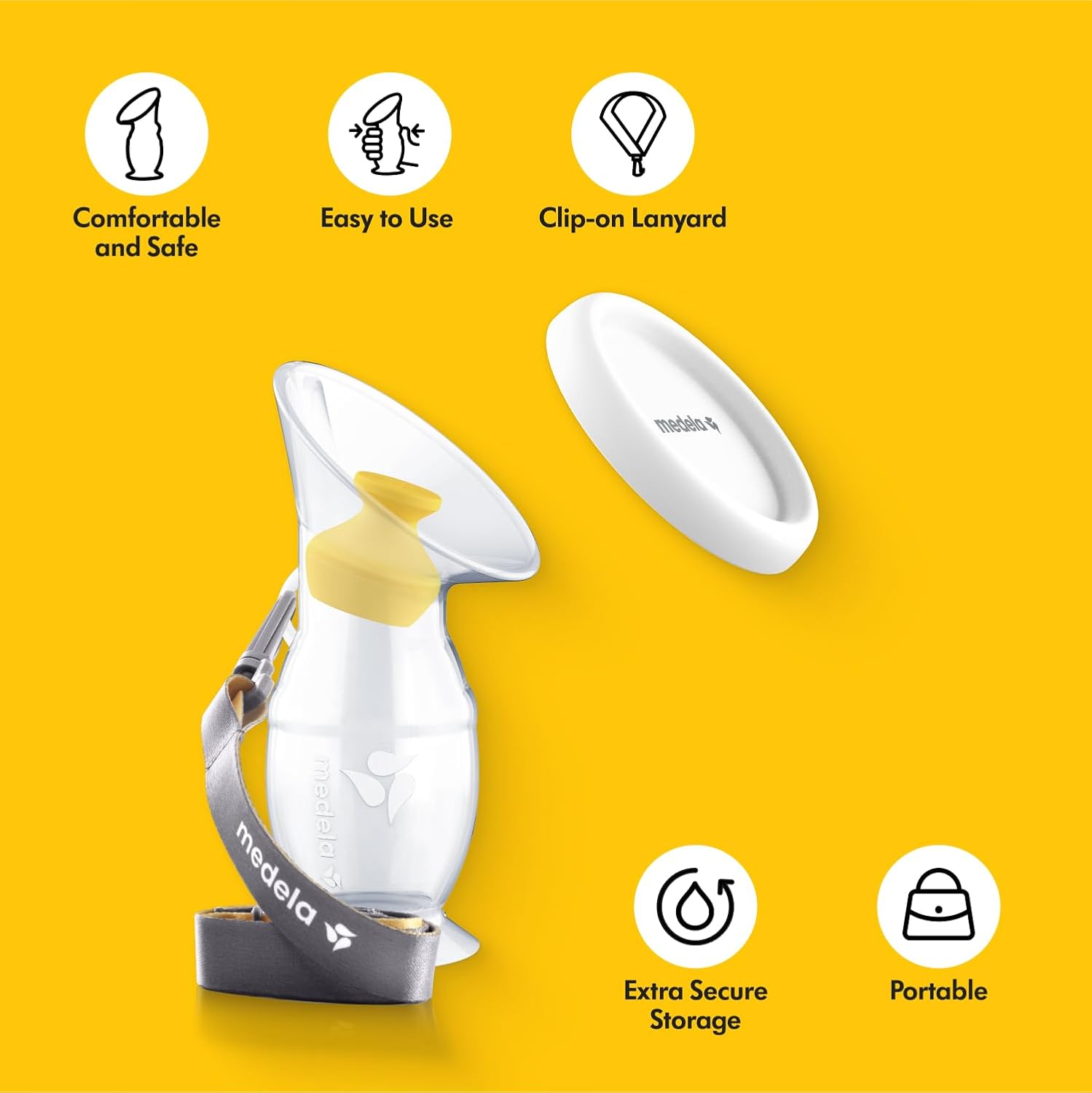Medela silicone breast milk collector with clip-on lanyard and storage cap