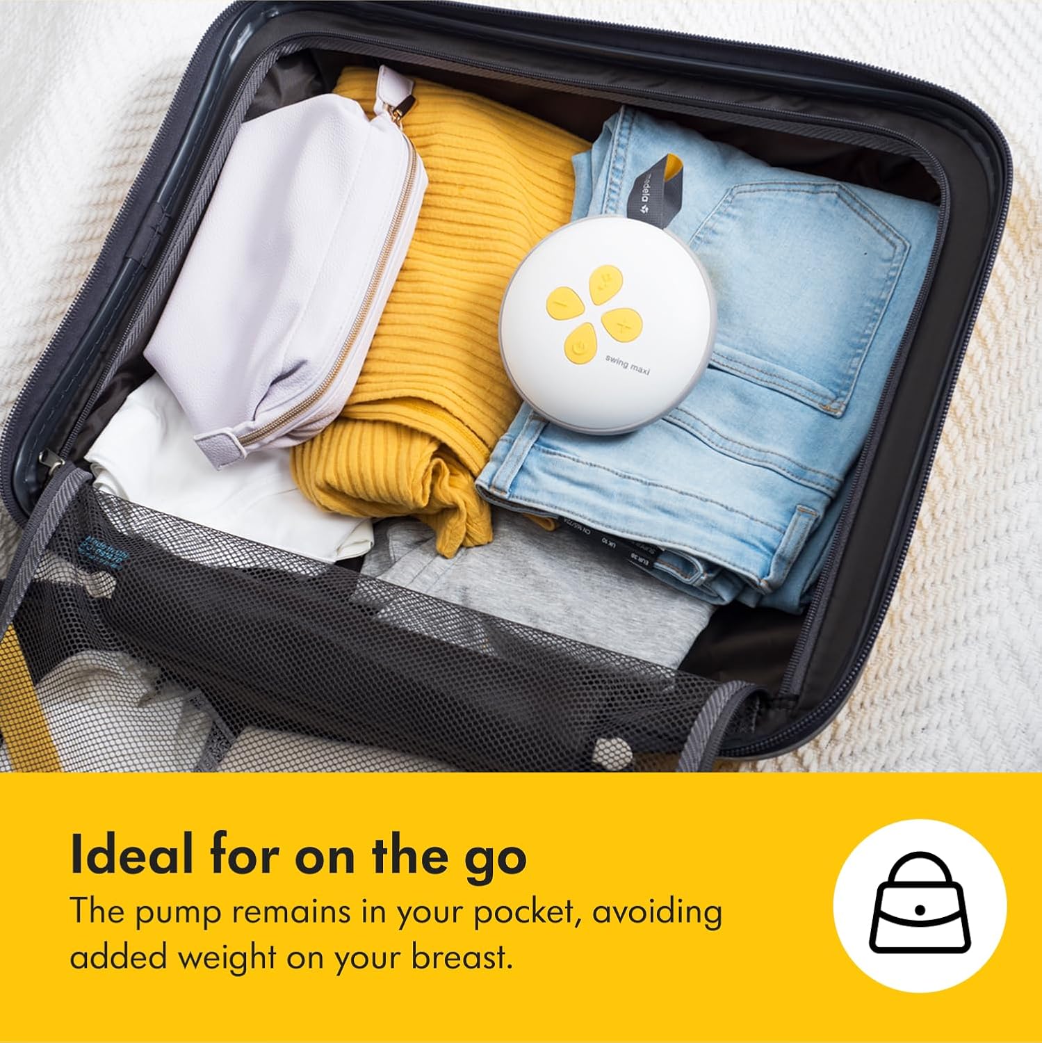 Medela Swing Maxi double electric breast pump in white with yellow detail
