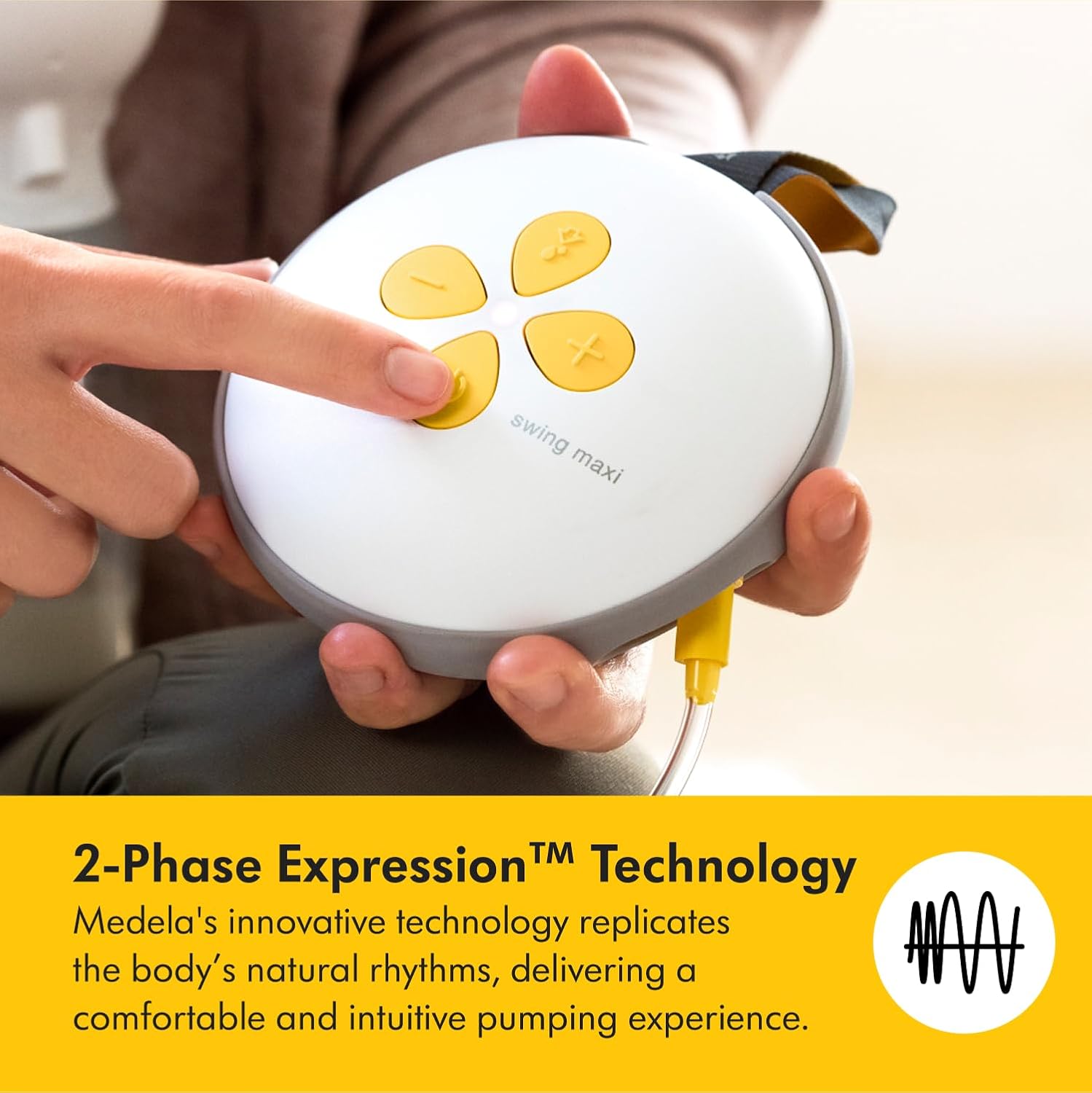 Medela Swing Maxi white double electric breast pump with yellow controls