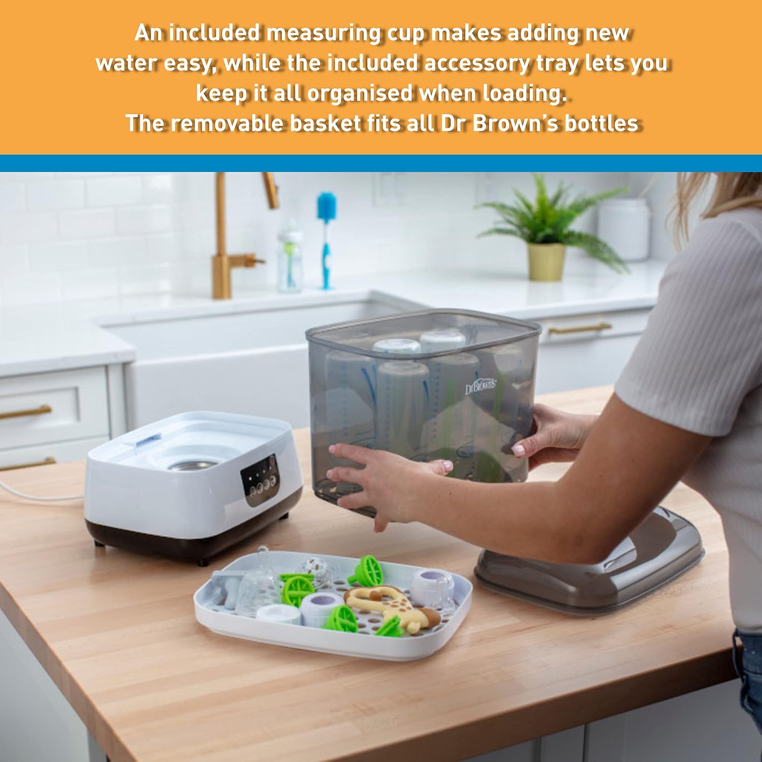 Dr. Brown's Deluxe Electric Bottle Sterilizer with removable basket and accessories