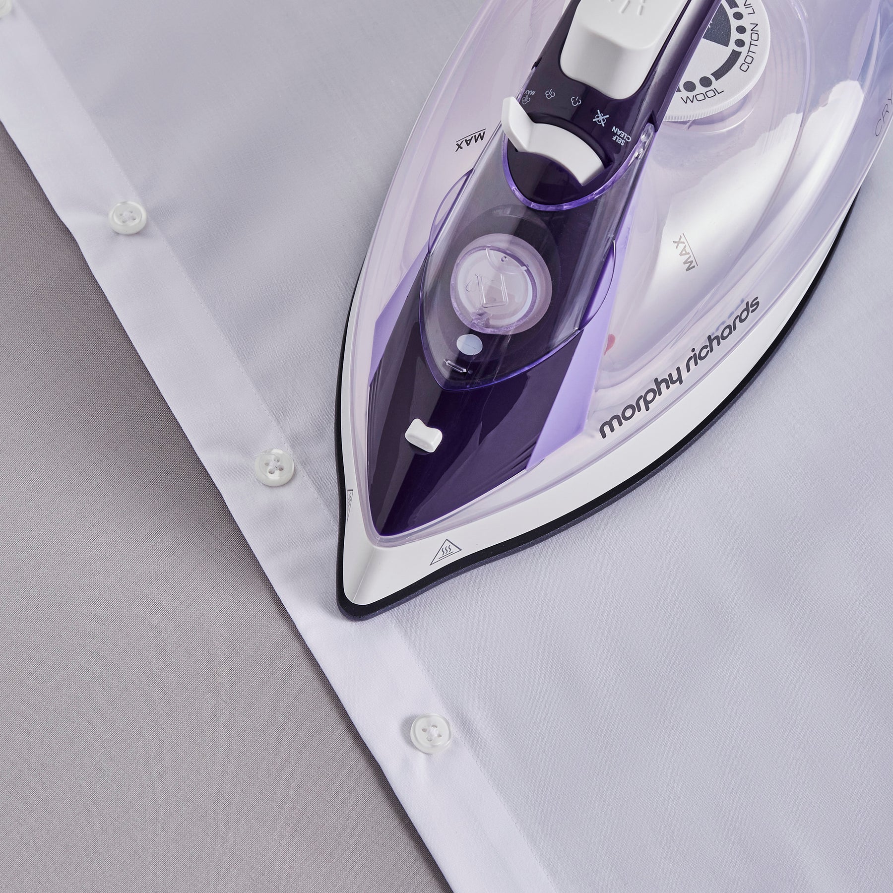 Crystal Clear 2400W steam iron purple on white shirt fabric