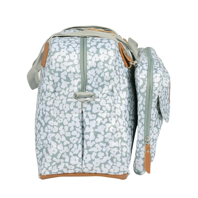 Béaba Geneva II changing bag cherry blossom print 23 litres with tan handles