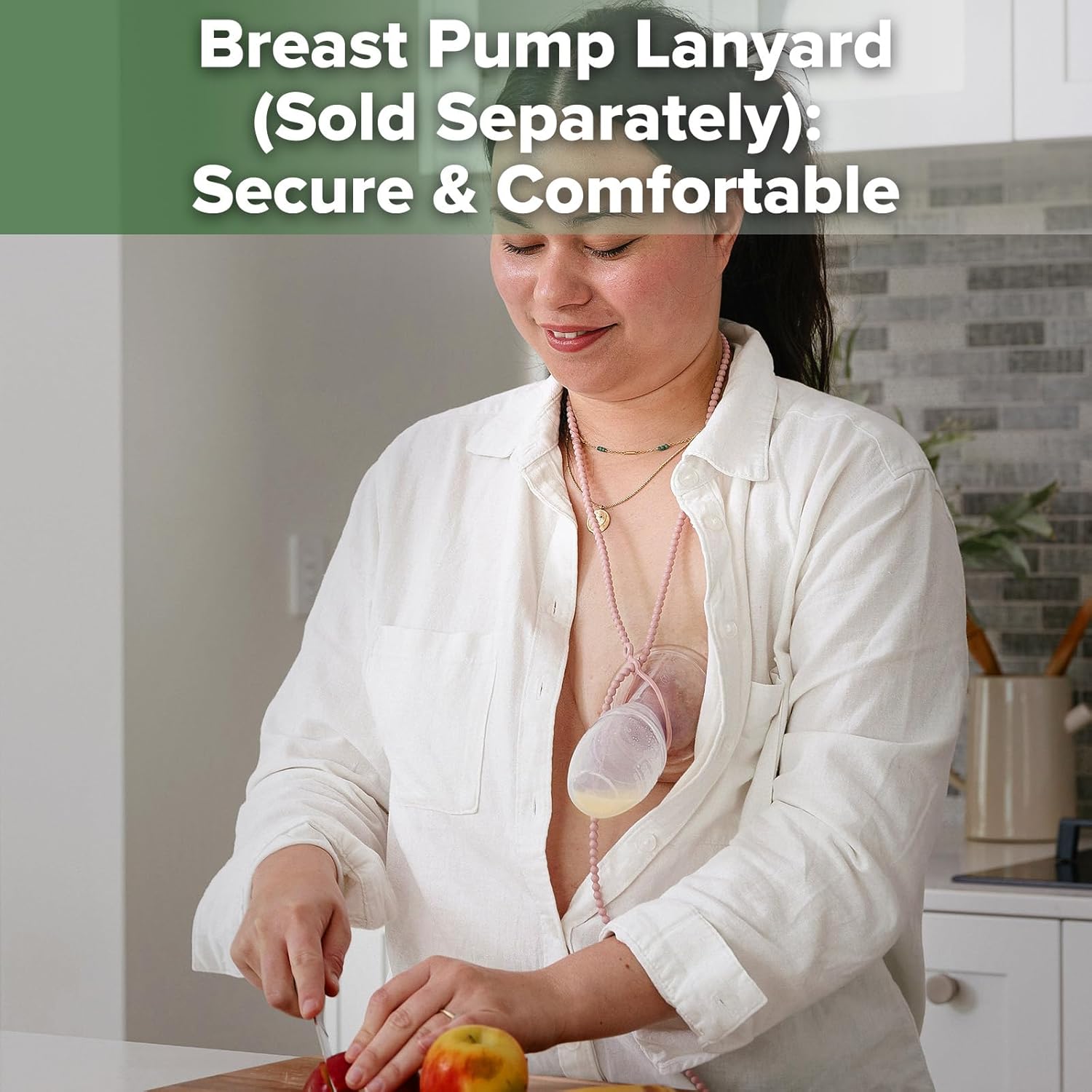 Haakaa manual breast pump silicone with pink lanyard cord attachment