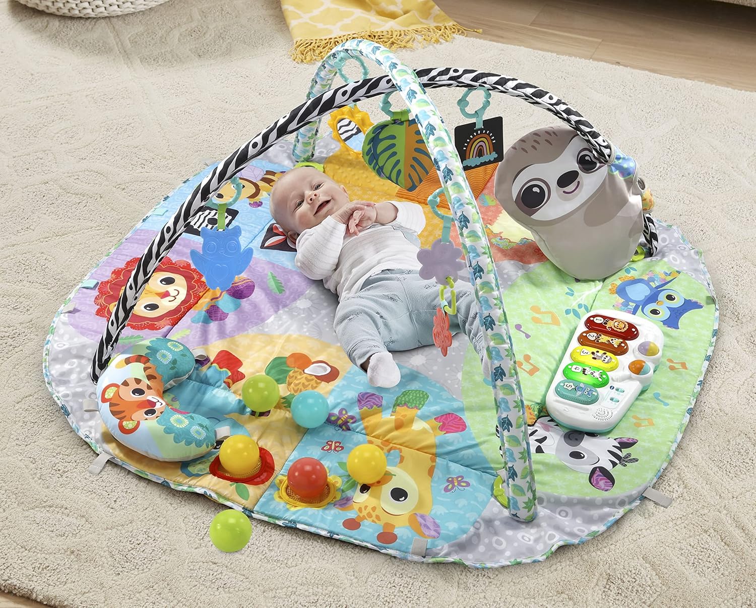 Joie Snacker 2-in-1 Highchair colourful play mat with toys and arch