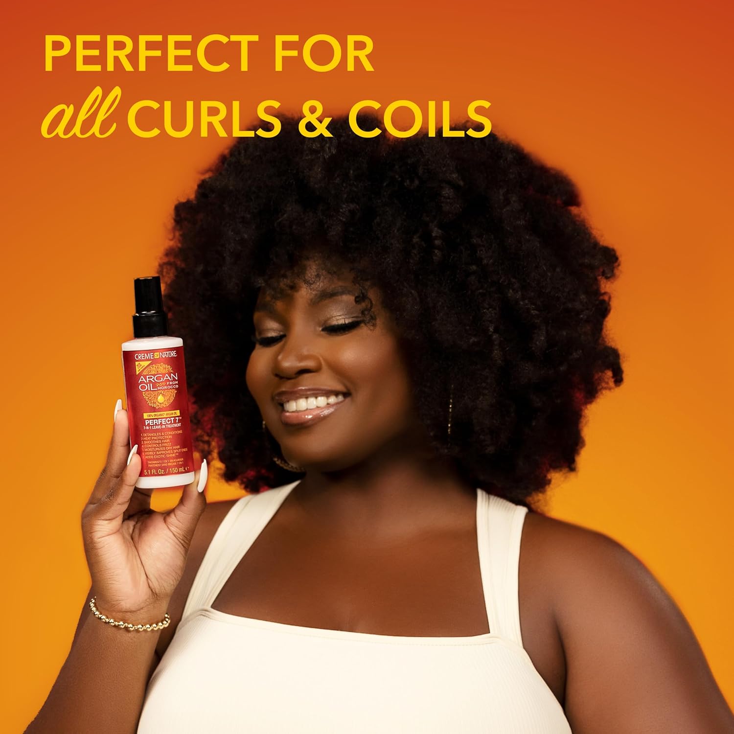 Creme of Nature Argan Oil Perfect 7-in-1 Leave-In Treatment spray bottle