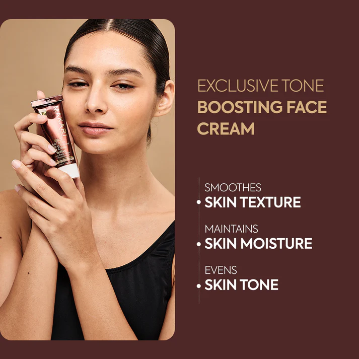 Makari Exclusive Tone Boosting Face Cream 50ml tube held in hand