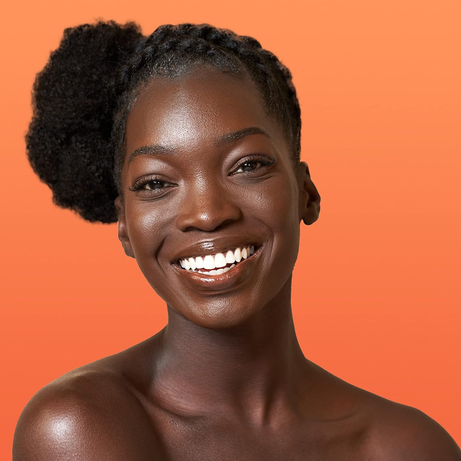 Cantu Shea Butter Grow Strong Strengthening Treatment hair product on model