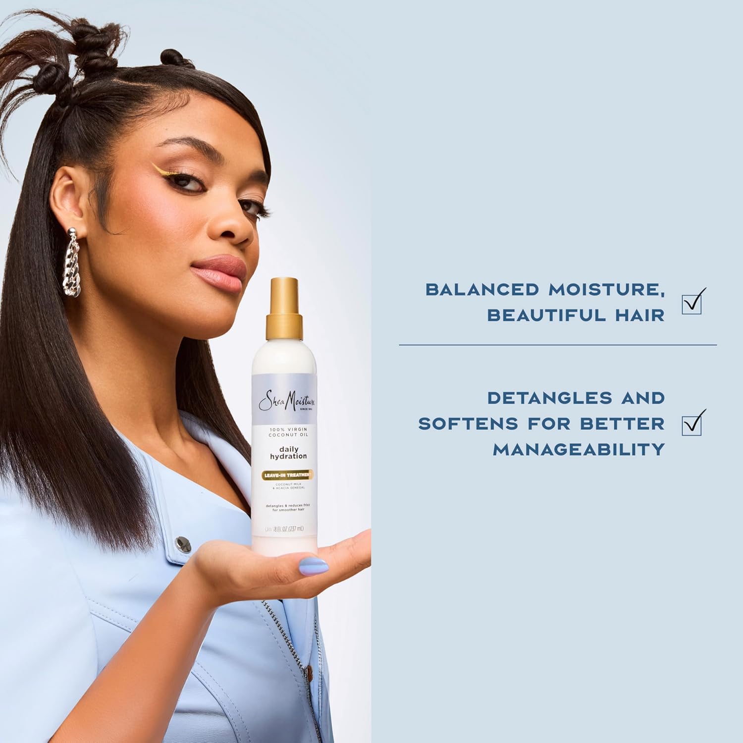 SheaMoisture 100% Virgin Coconut Oil leave-in treatment spray, 237ml bottle with gold cap
