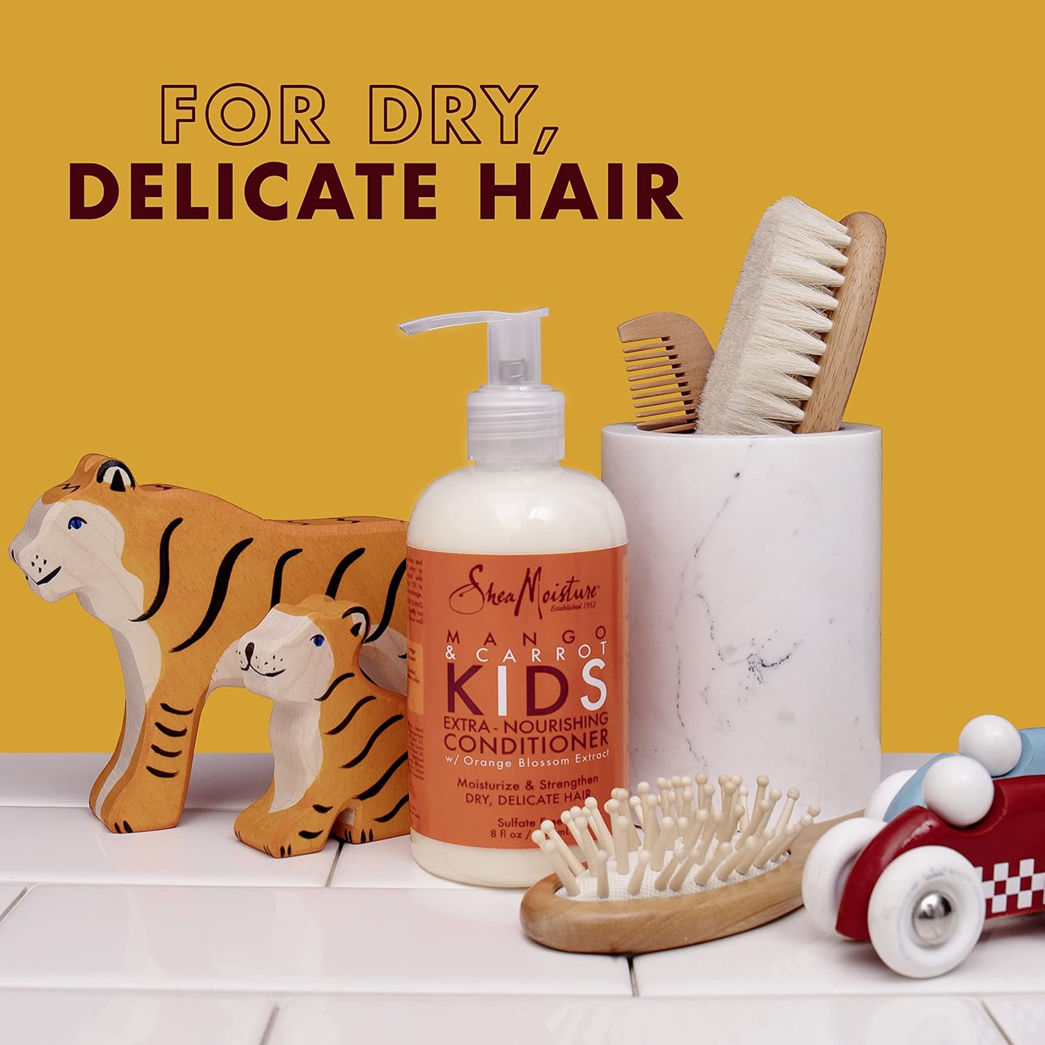 SheaMoisture Mango & Carrot Kids Extra-Nourishing Conditioner 237ml orange bottle with pump dispenser