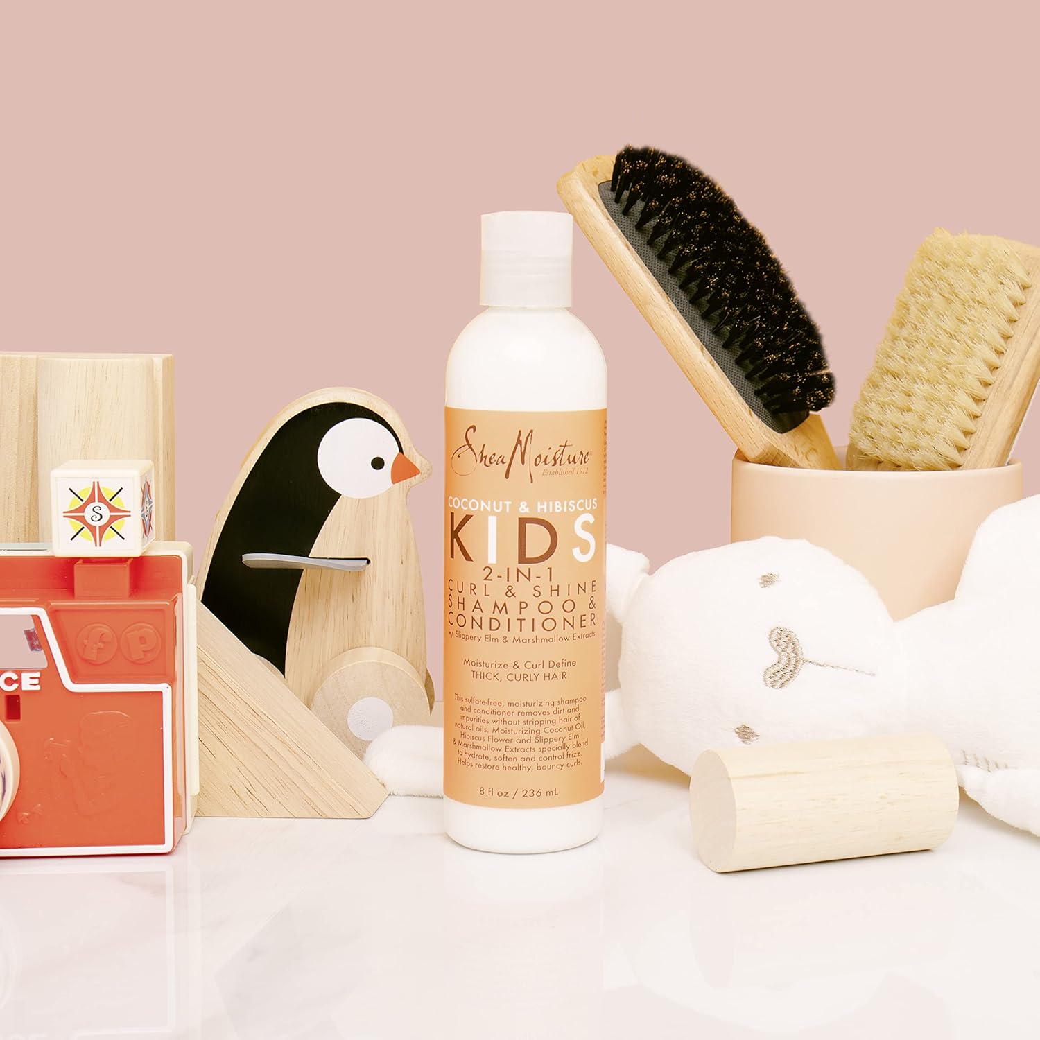 SheaMoisture Coconut & Hibiscus Kids extra-moisturising detangler 237ml bottle with white cap