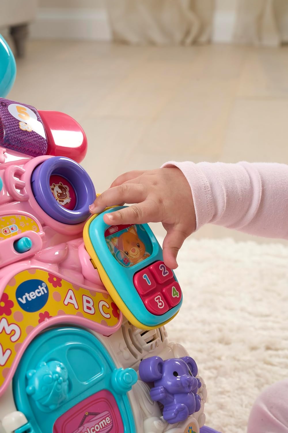 VTech First Steps Baby Walker with interactive activity panels and buttons