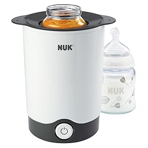 Nuk Thermo Express white bottle warmer with control button and sample bottle