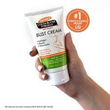 Palmer's Cocoa Butter Formula Bust Cream 125ml tube in hand