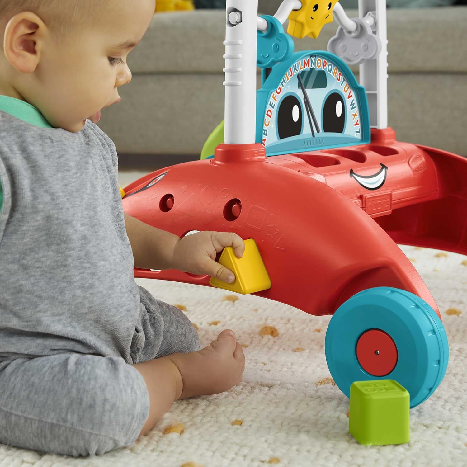 Fisher-Price 2-Sided Steady Speed Walker red and turquoise with yellow blocks