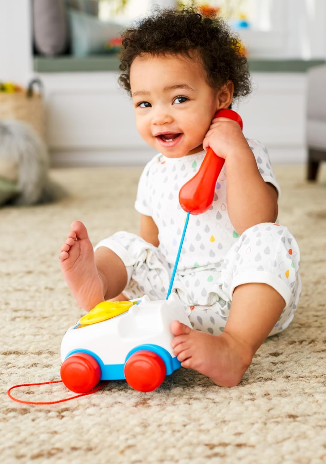 Fisher-Price Chatter Telephone white with red handset and blue wheels