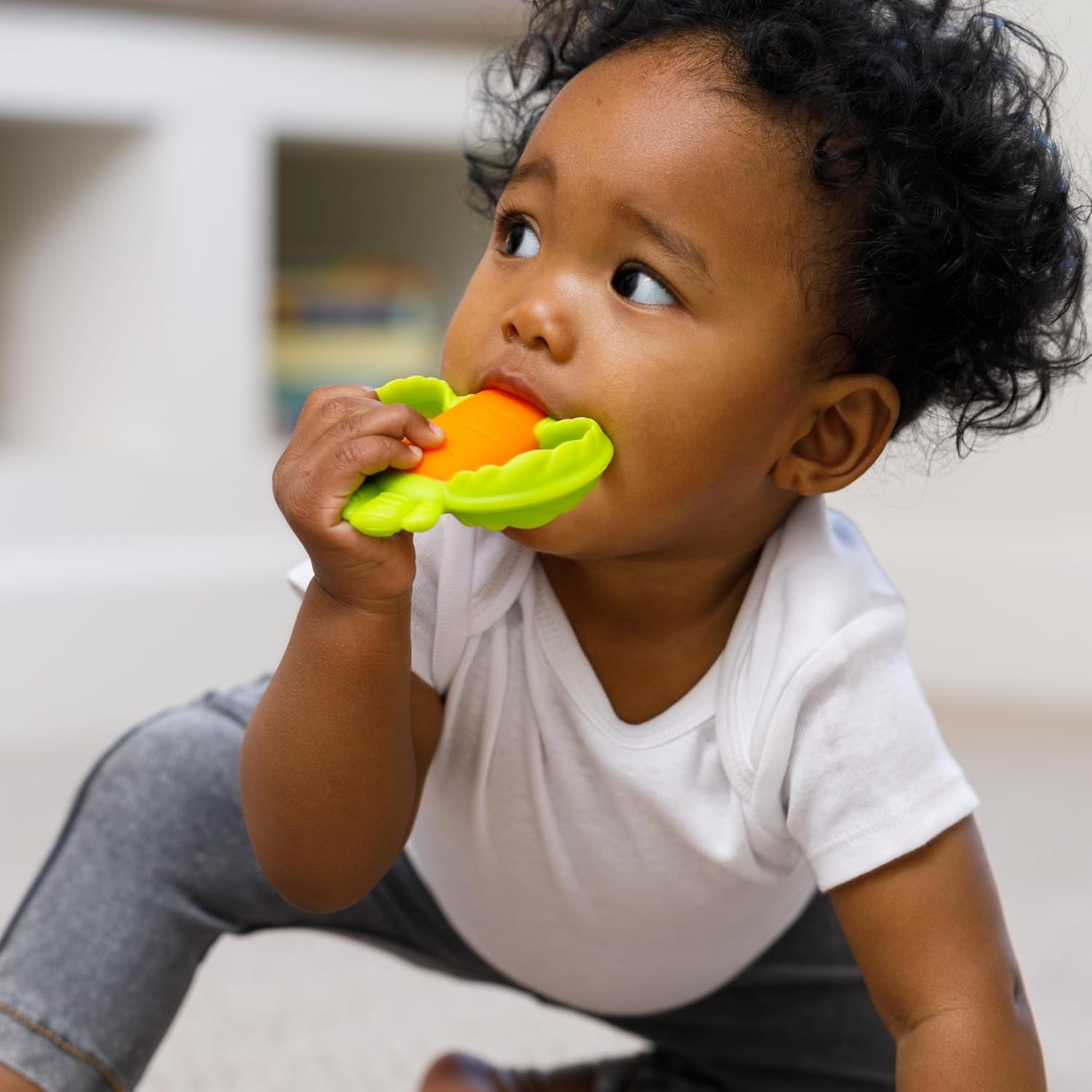 Infantino Lil' Nibbles textured silicone carrot teether in orange and green