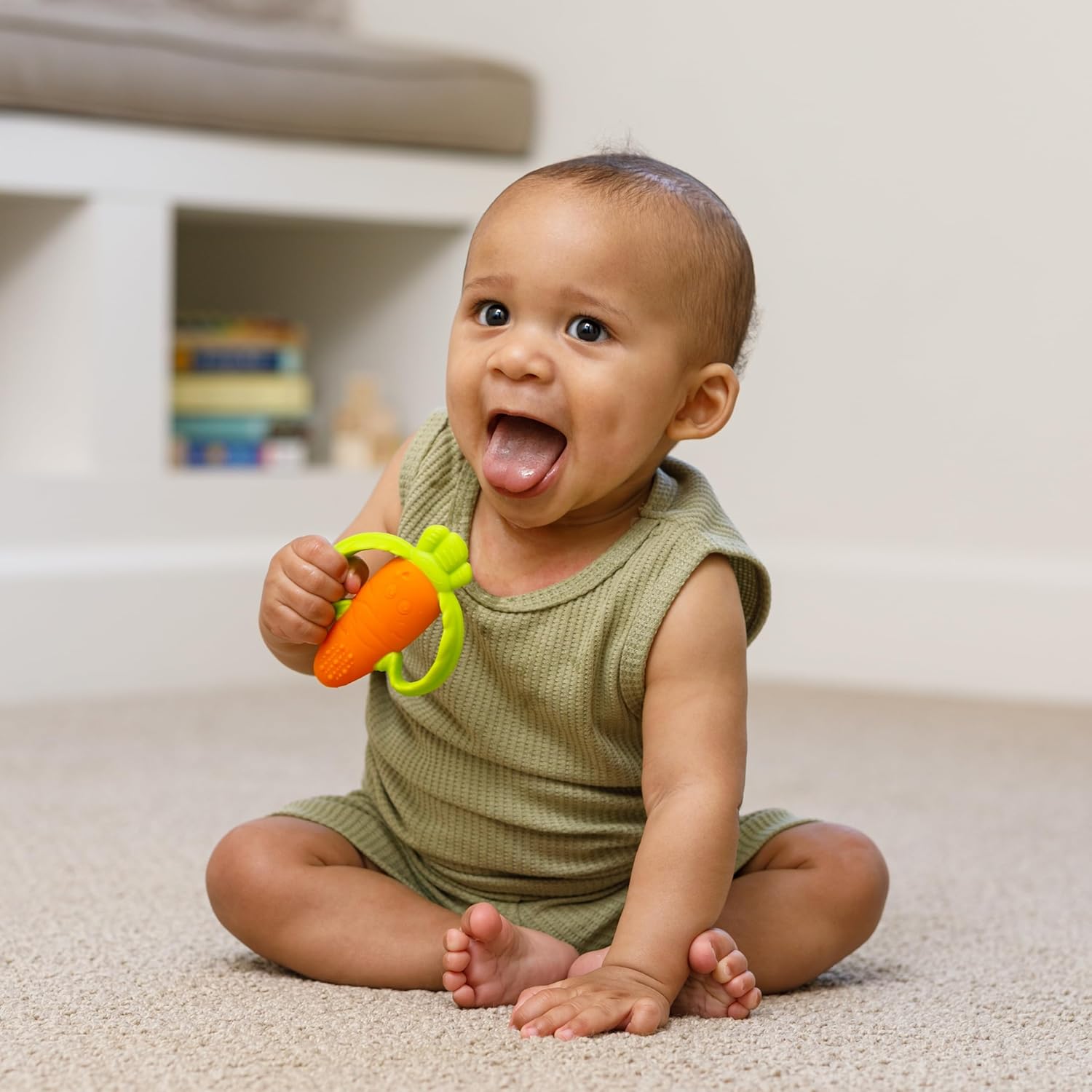 Infantino Lil' Nibbles orange and green silicone carrot teether with textured surface