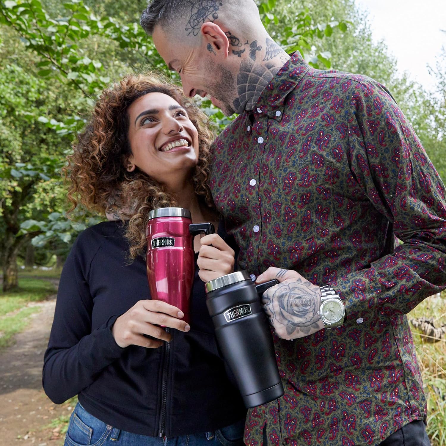 Thermos Stainless King 470ml travel mug in raspberry and black stainless steel