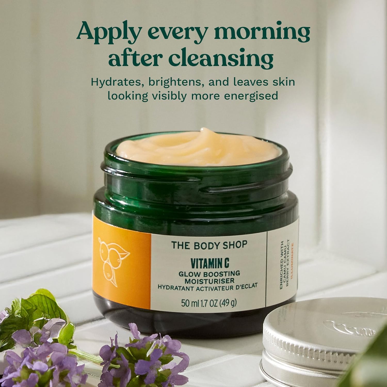 The Body Shop Vitamin C Glow Boosting Moisturiser 50ml jar with green lid