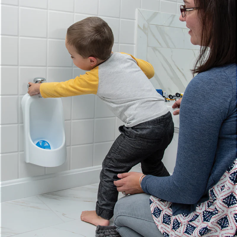 Summer Infant My Size white wall-mounted urinal with blue accent