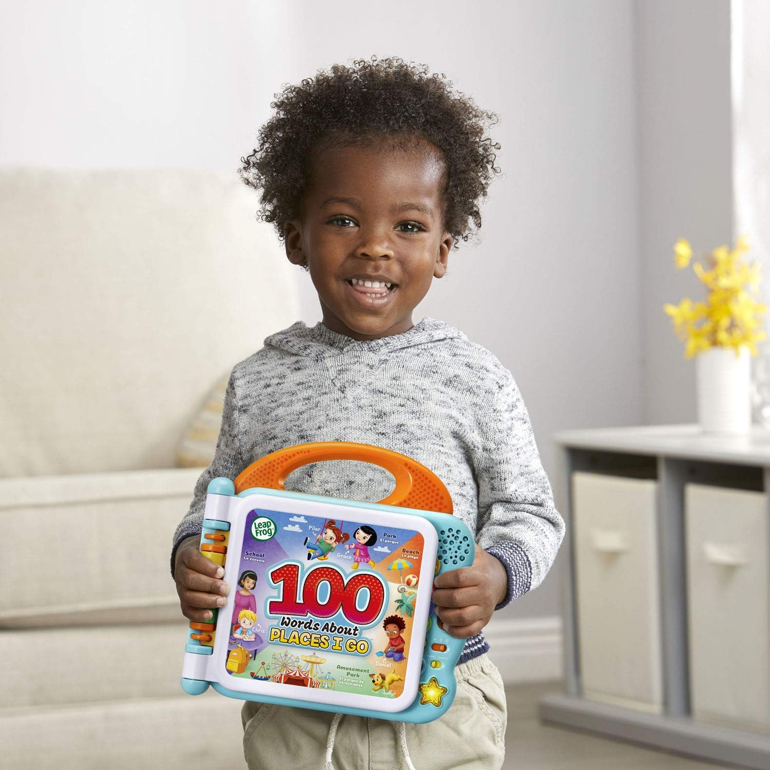 LeapFrog 100 Words About Places I Go interactive learning book with orange handle