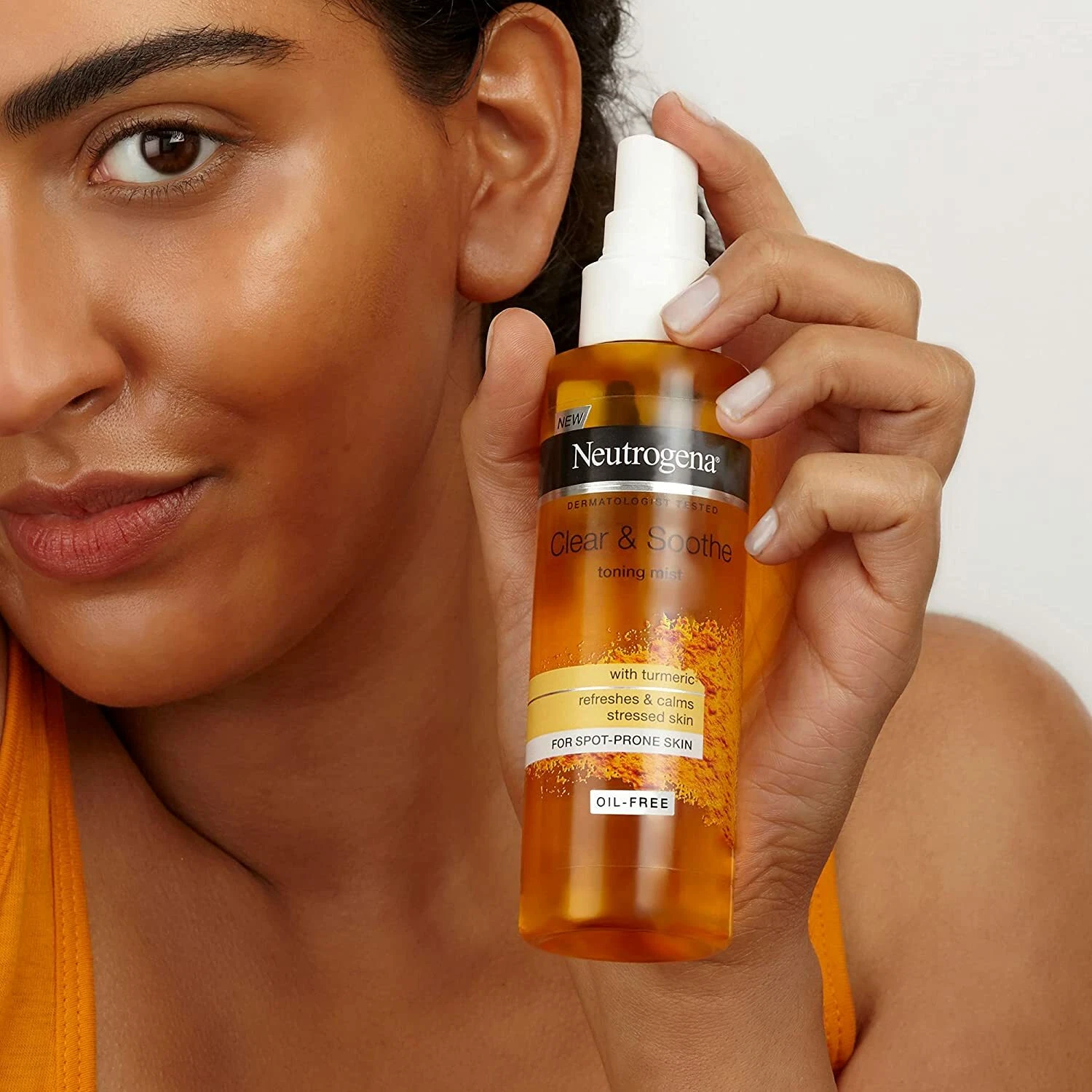 Neutrogena Clear & Soothe amber toning mist spray 125ml bottle with turmeric