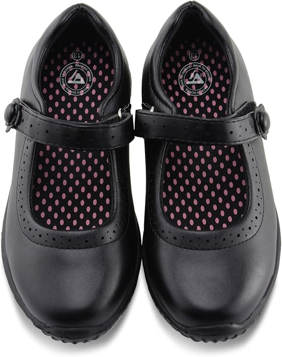 Black leather girls school shoes with pink polka dot lining and Mary Jane strap