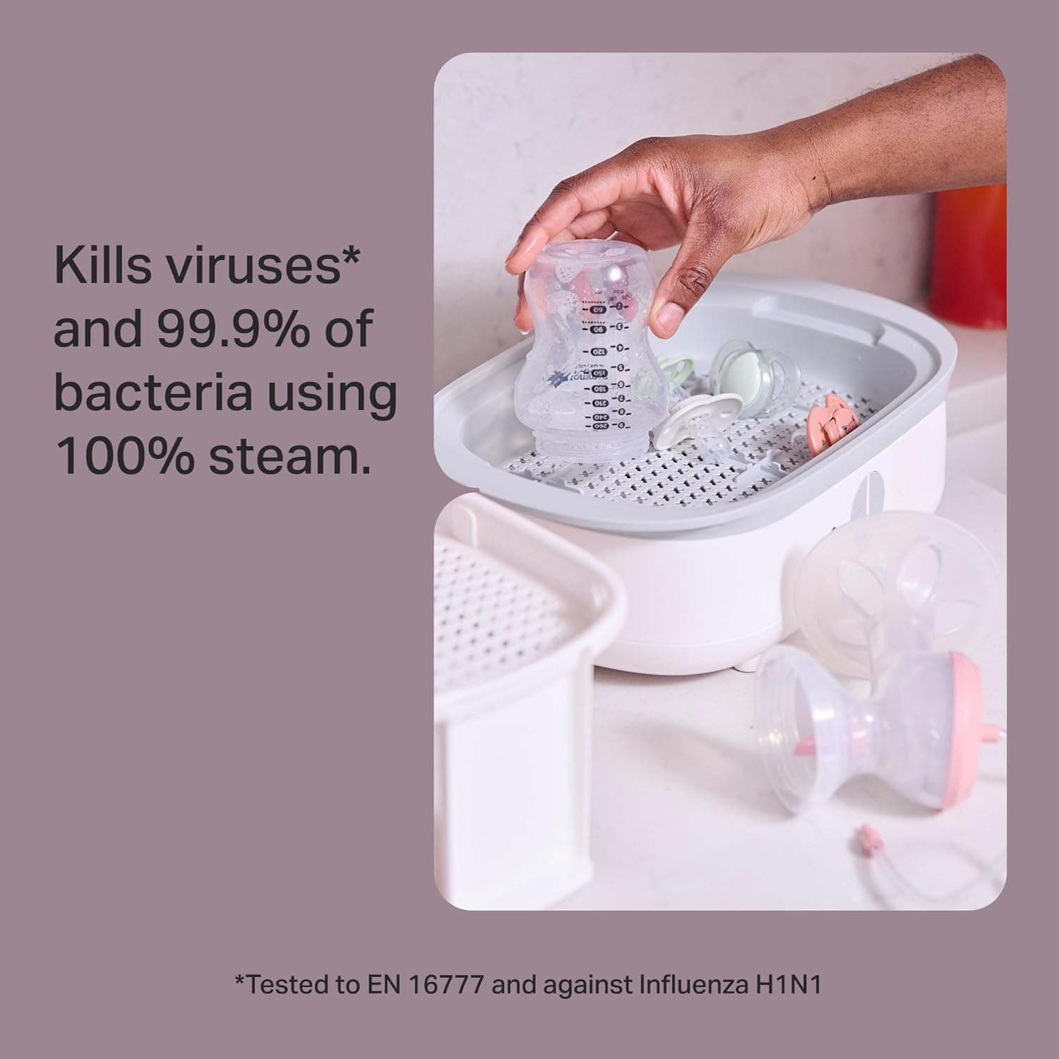 Tommee Tippee Supersteam electric steam steriliser in white with bottle inside