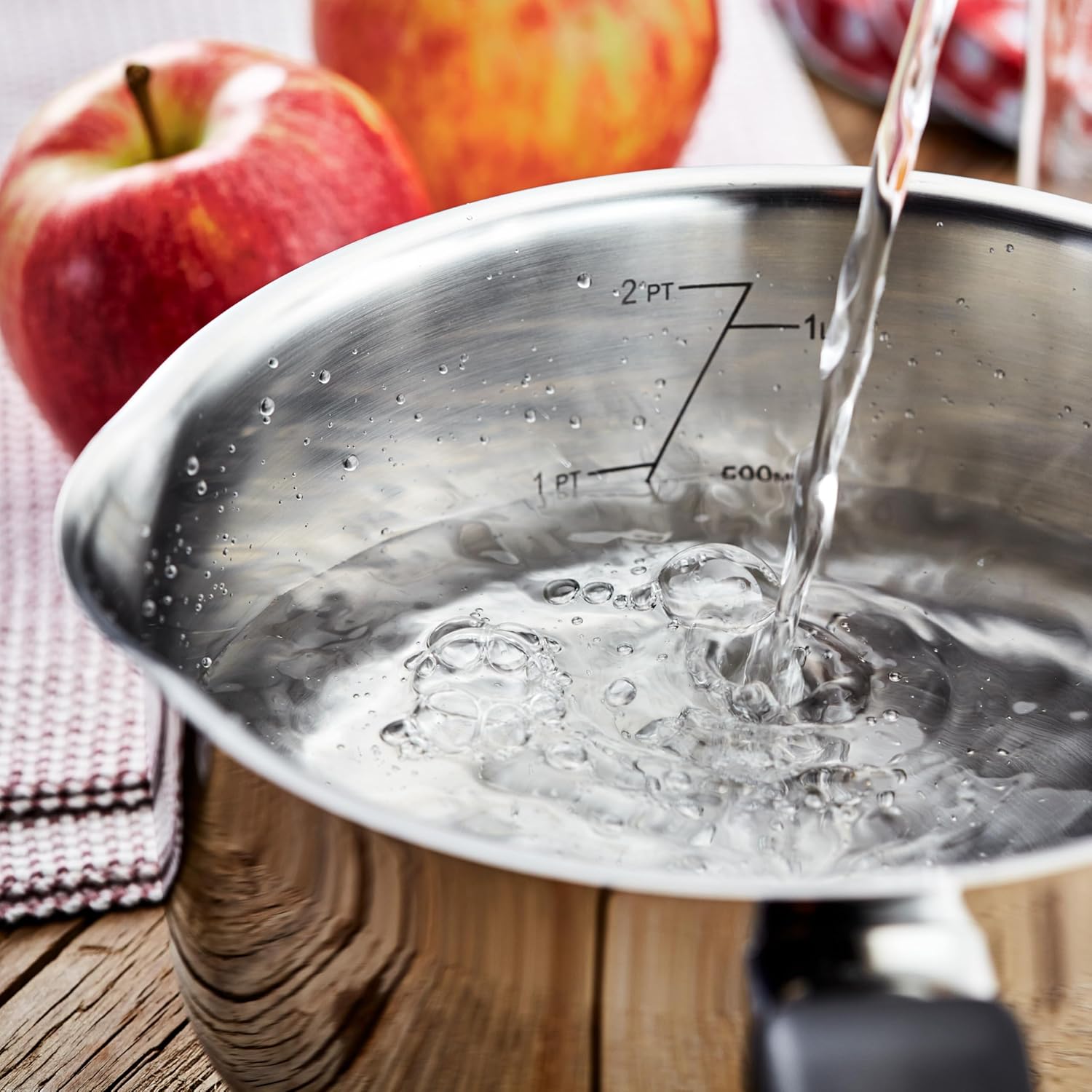 Judge Vista Original stainless steel saucepan with measurement markings and water