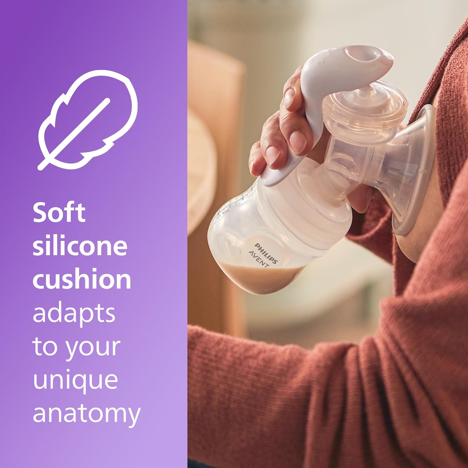 Philips Avent white manual breast pump with soft silicone cushion and collection bottle