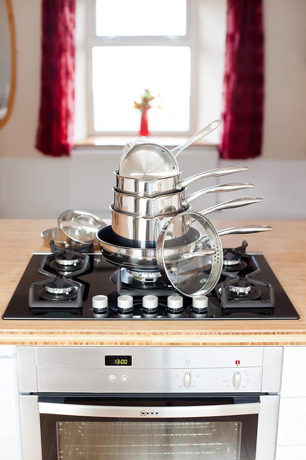 Stellar 7000 stainless steel five-piece draining saucepan set with strainer lids