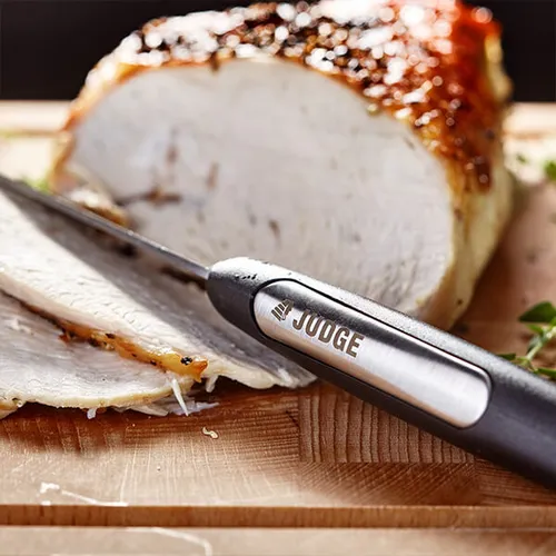 Judge Sabatier IP60 carving knife with black handle slicing meat