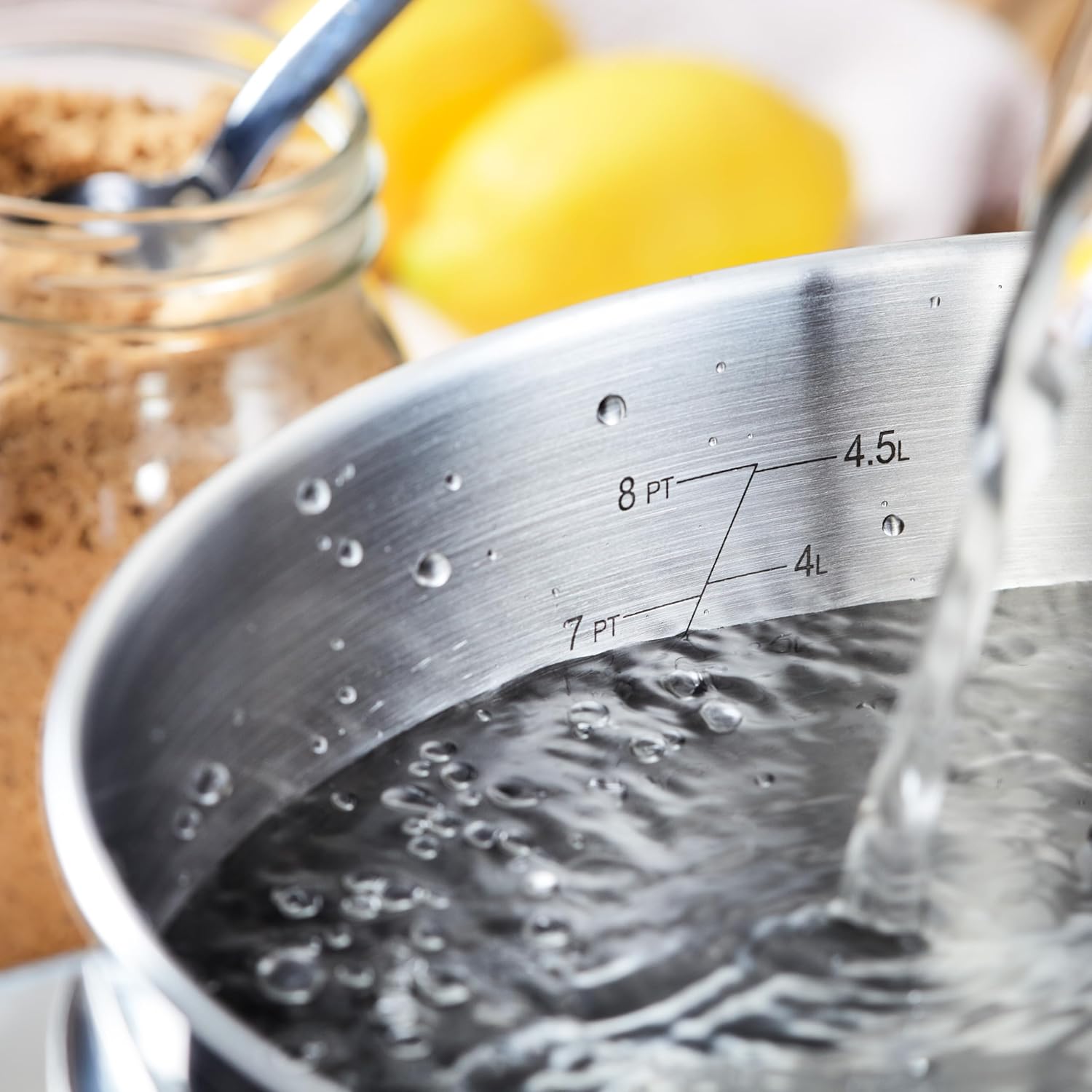 Judge Essentials stainless steel saucepan with measurement markings and blue handle