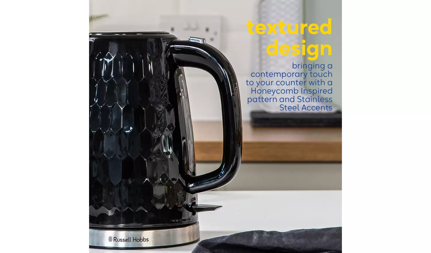 Russell Hobbs Honeycomb black plastic kettle with textured design and stainless steel base