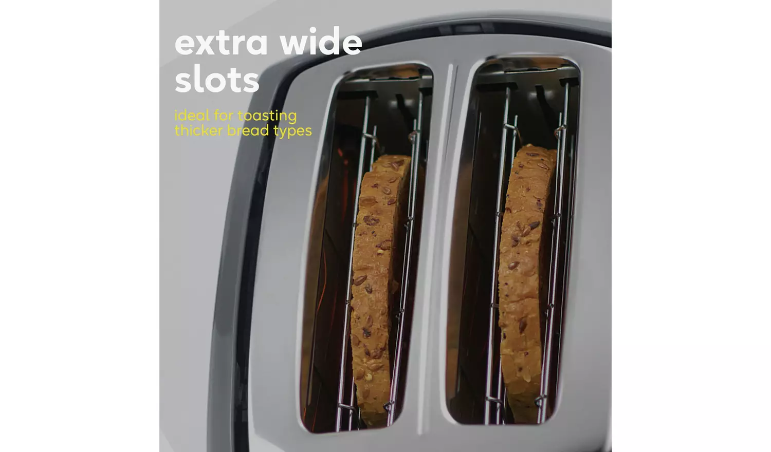 Russell Hobbs Honeycomb grey two-slice toaster with extra-wide slots and bread inside