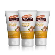 Raw Shea Nourish Hand Cream three tubes with gold packaging