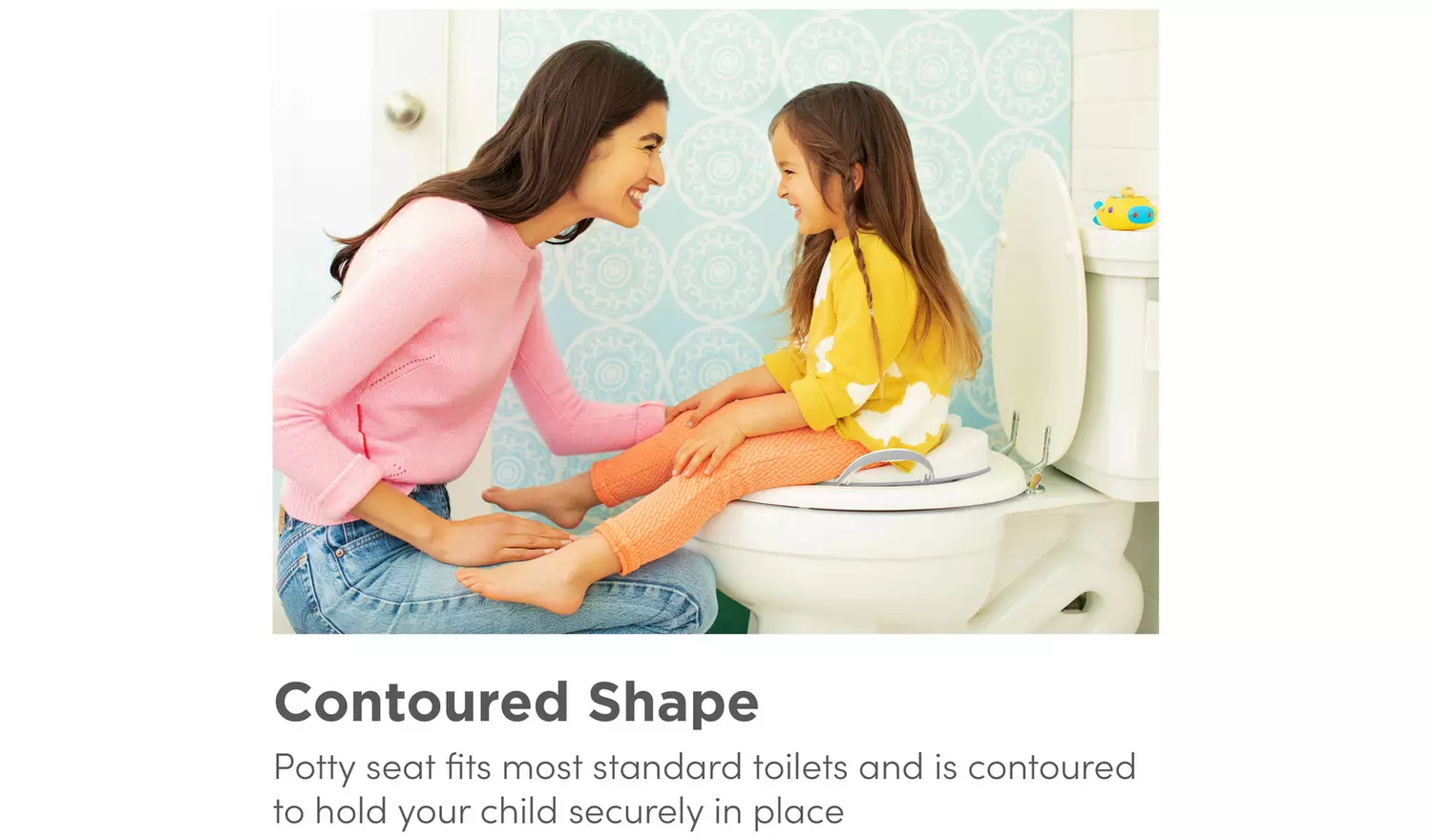 Munchkin white contoured toilet trainer seat with child and caregiver using it
