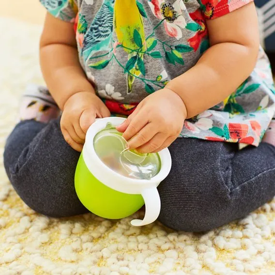 Munchkin silicone snack pot with lid in lime green and white