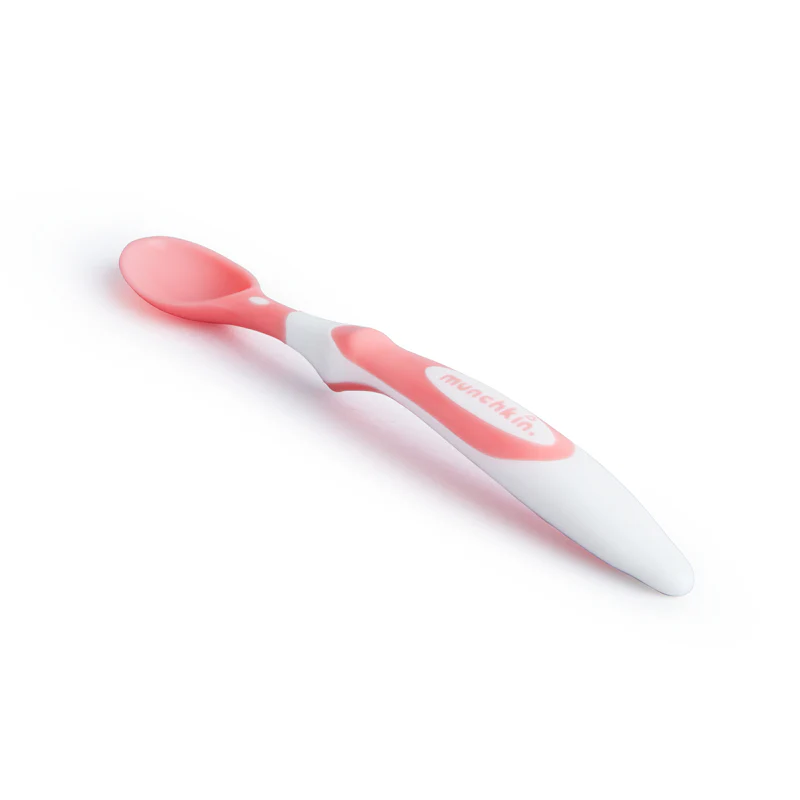 Munchkin soft tip infant spoon with pink bowl and white handle