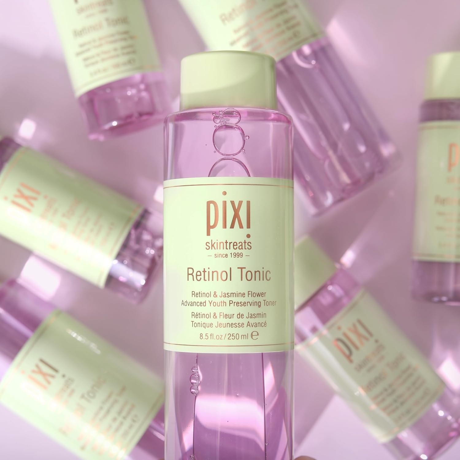 PIXI Retinol Tonic 250ml pink facial toner with retinol and jasmine flower